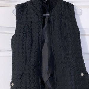 Black quilted vest